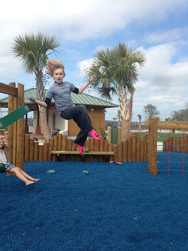 The picture was taken at the new Shelter Cove playground, which we went to in late March. My son, Jackson, is a natural-born thrill seeker, therefore, he created a challenge of posing mid-flight after launching himself from the swings. Now as a parent I cringed at the thought of injury and recklessness, but he insisted on getting the 'best shot.' It only took us a couple shots to get one he liked.